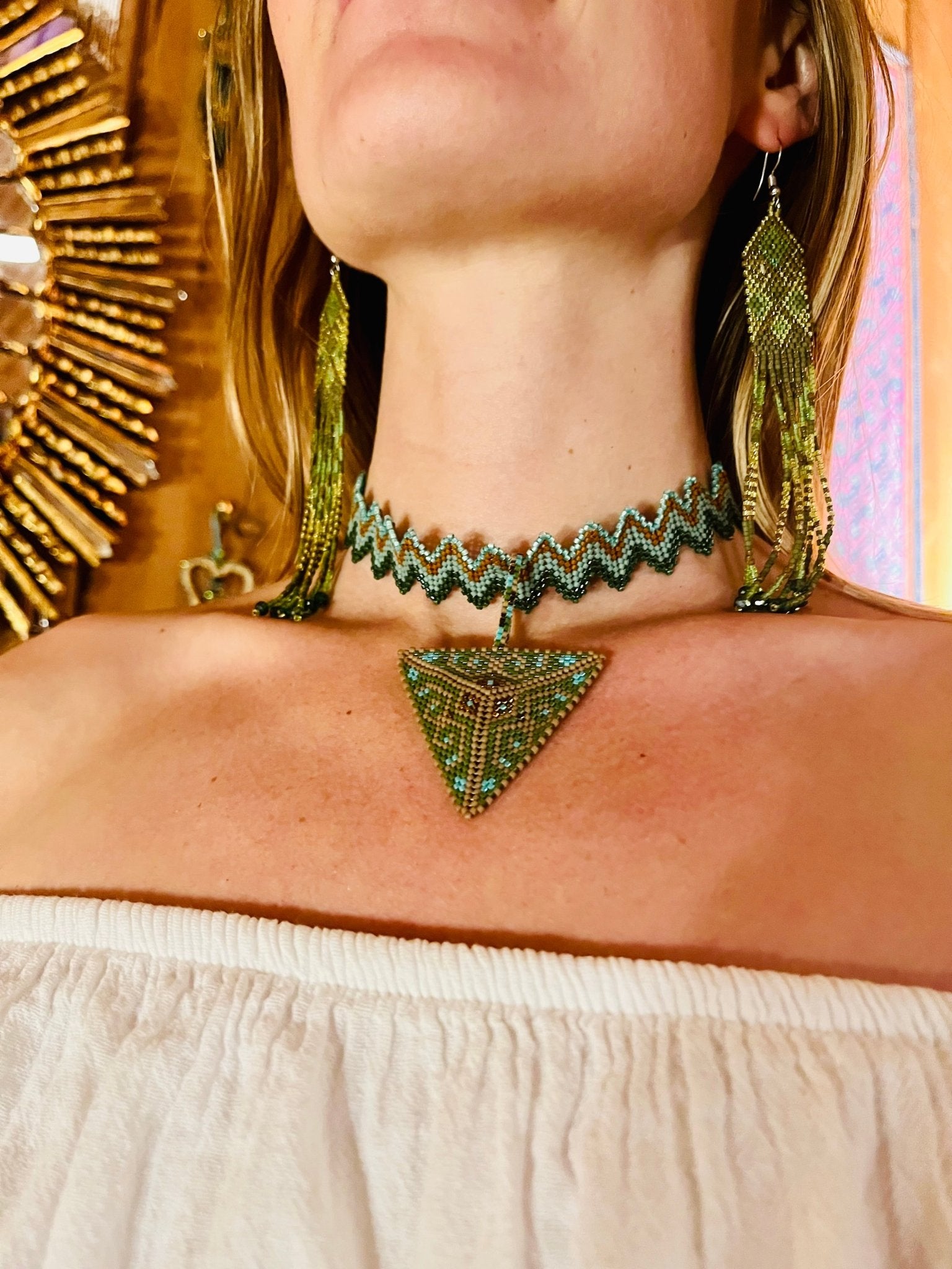 Model wearing Crown Pyramid Adornment handcrafted in Guatemala with Japanese Miyuki beadwork