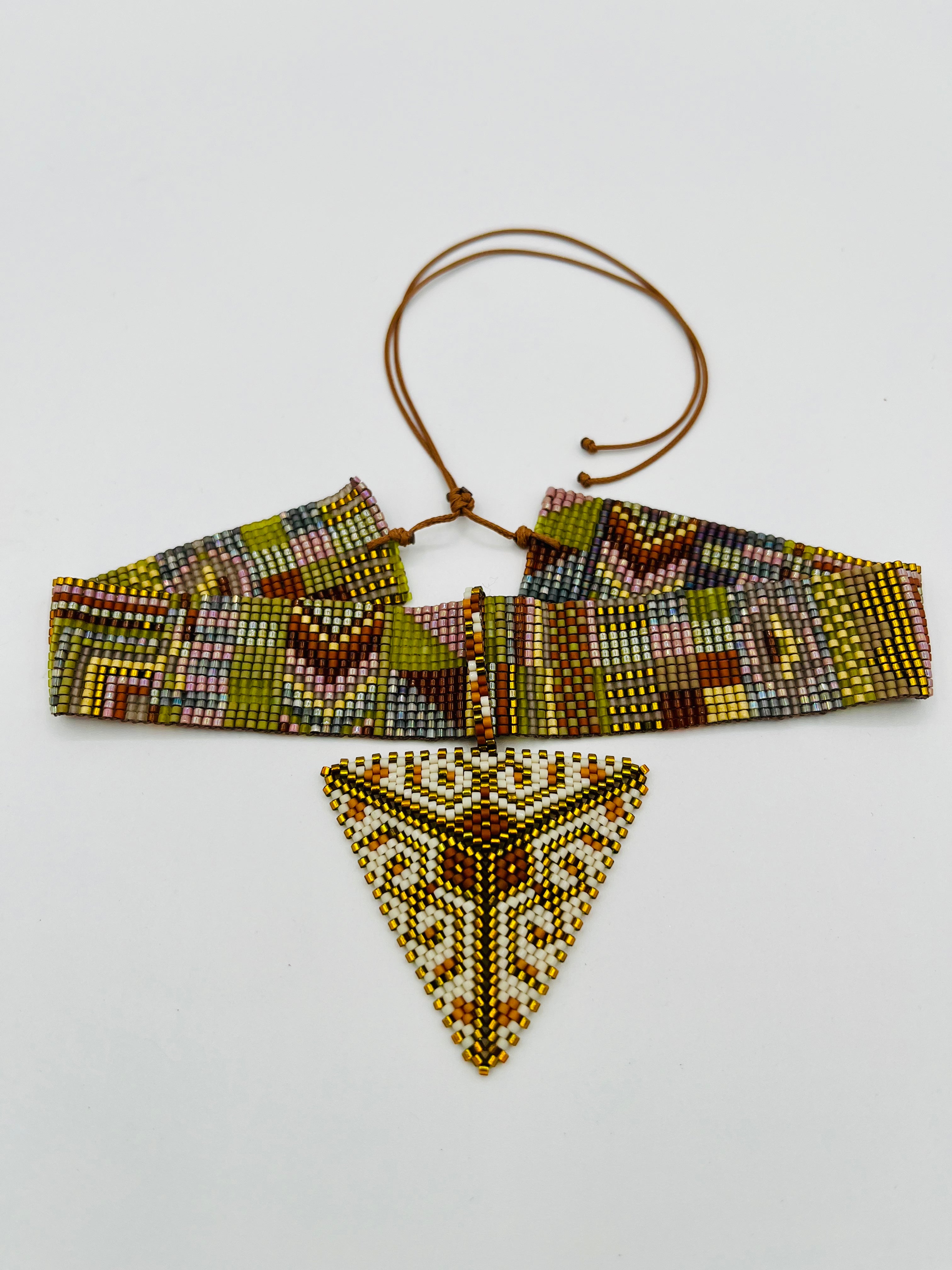 Pyramid Adornment 16 Strand handcrafted by the T'zutujil collective in Guatemala, worn as a crown adornment with Miyuki beadwork