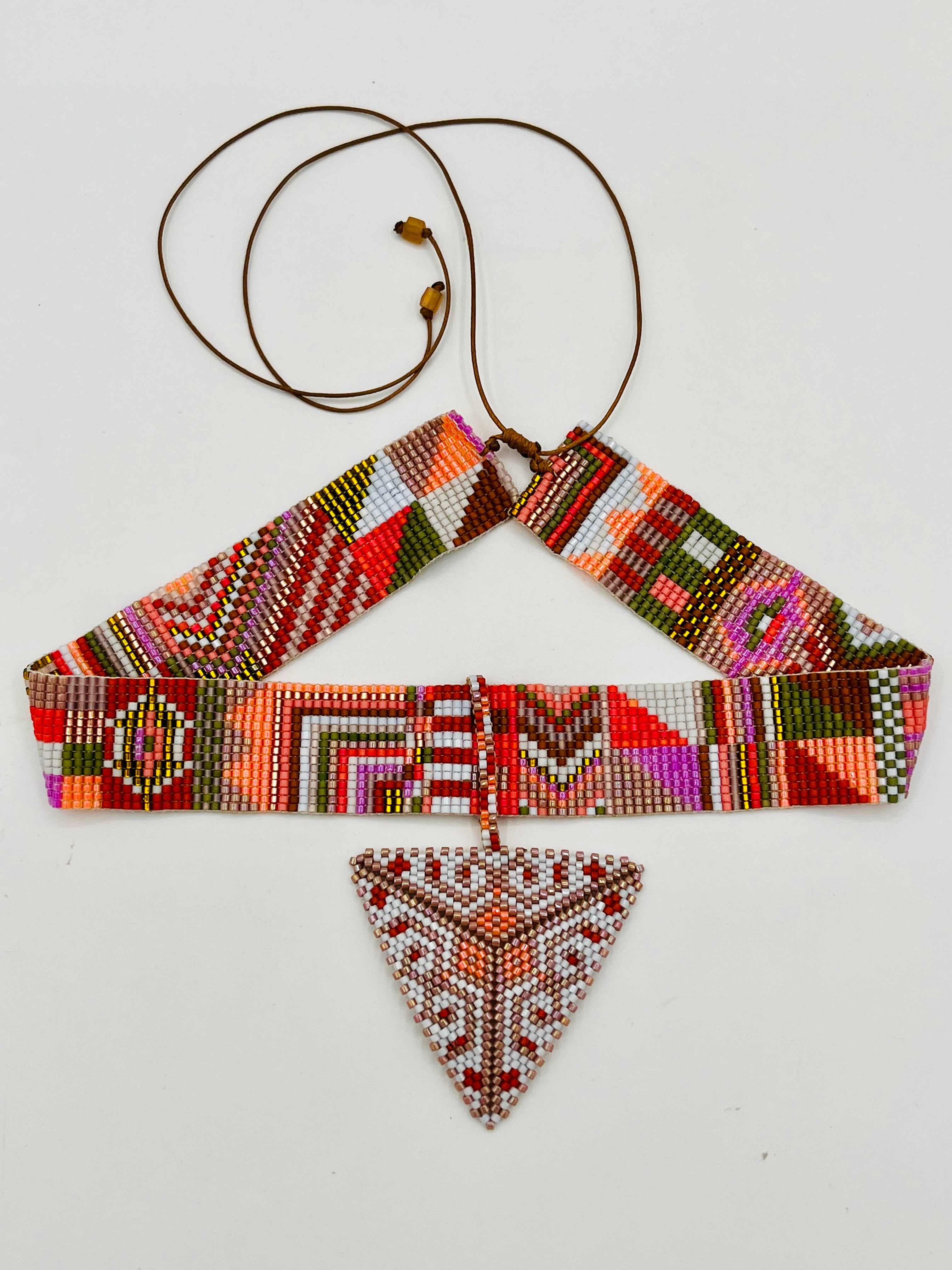 Pyramid Adornment 16 Strand handcrafted by the T'zutujil collective in Guatemala, worn as a crown adornment with Miyuki beadwork